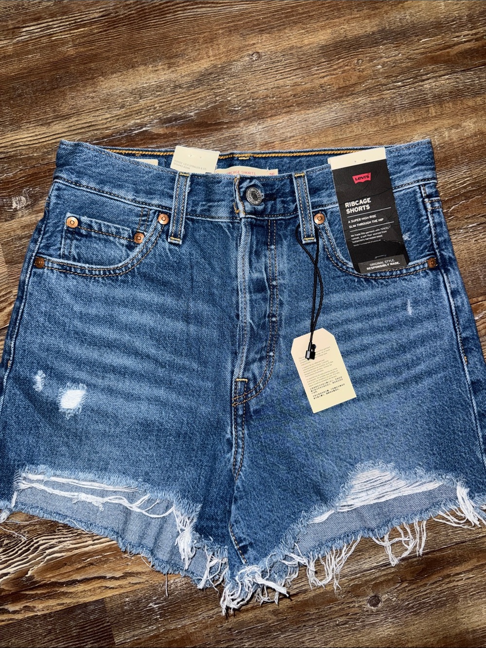 Levi's Medium Blue Distressed High-Rise Jean Shorts